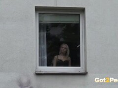 Got2Pee - Blonde babe squats in the window to piss over the edge Thumb