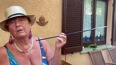 Slut wife Augusta- dom smoking fetish with hat, glasses and 20&#039_ holder in public Thumb