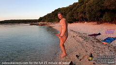 nude fire dancing on the beach at sunset Thumb