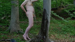 Naked peeing outdoors in the forest Thumb