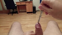 Small penis plug is fully inside pushed by the other cock sounding rod Thumb