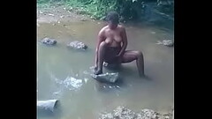 hot african woman taking bath Thumb