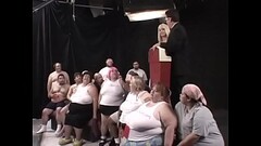 Two dozens of lard-asses suck, lick and fuck each other during The Worlds First 300 Lb Gang Bang, or Thumb