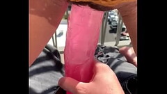 Slut fucks massive dildo in daytime Thumb