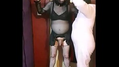 bisexual crossdresser in bondage blindfolded and feed his own piss by masked girlfriend Thumb