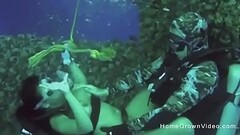Fucking this busty cutie underwater while scuba diving Thumb