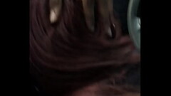 Red head gives head in car back seat Thumb