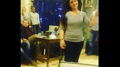 arab girl dancing with friends in Cafe Thumb